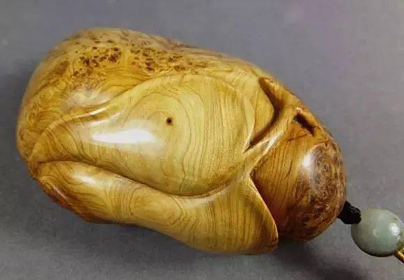 掌中贵气——崖柏手把件的艺术与品鉴之道